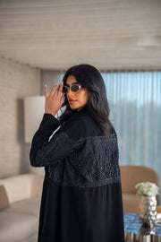 luxurious blend of crepe and satin fai abaya with intricate embroidery and soft drape