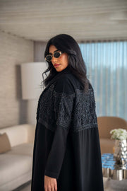 luxurious blend of crepe and satin fai abaya with intricate embroidery and soft drape