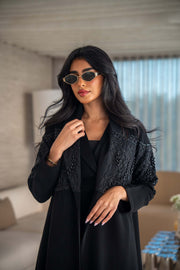 luxurious blend of crepe and satin fai abaya with intricate embroidery and soft drape