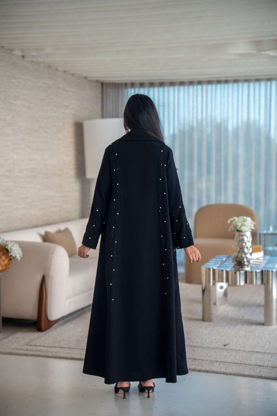 Velira black crepe abaya with delicate dot pattern embroidery and flowing silhouette