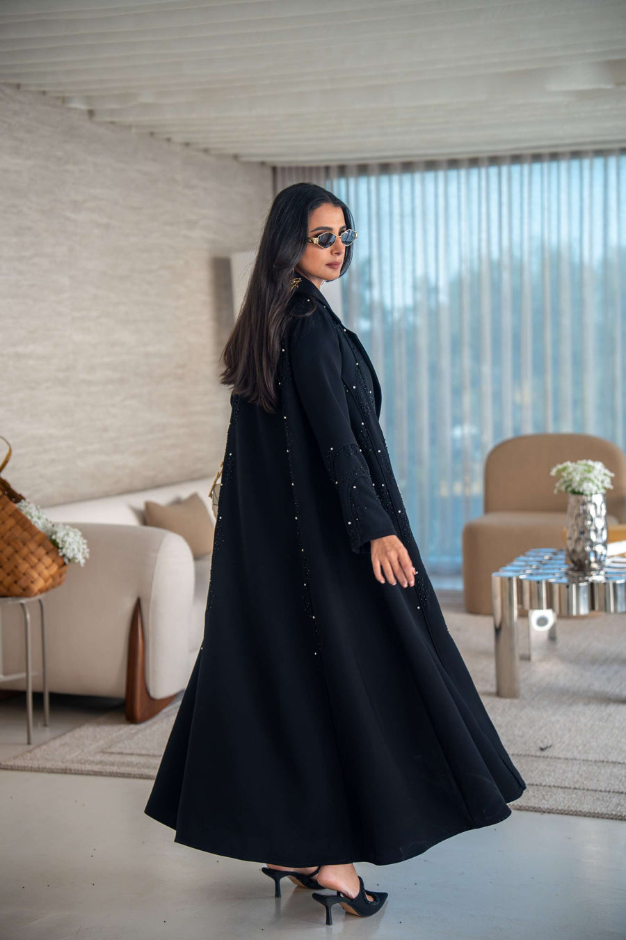 Velira black crepe abaya with delicate dot pattern embroidery and flowing silhouette