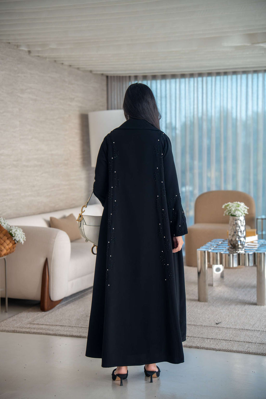 Velira black crepe abaya with delicate dot pattern embroidery and flowing silhouette