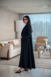Velira black crepe abaya with delicate dot pattern embroidery, elegant and flowing for everyday and special occasions