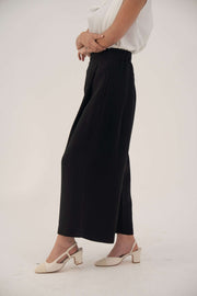 Silk black abaya with wide relaxed fit, open front, soft lapel, and long sleeves for elegant flow