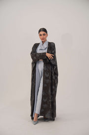 Silk Selva abaya with wide cut, open front, soft lapel, long sleeves, and subtle dark pattern for an elegant look