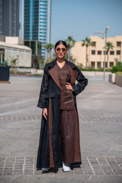 Modern Velora abaya in black and brown linen with wide lapels and structured street-style design