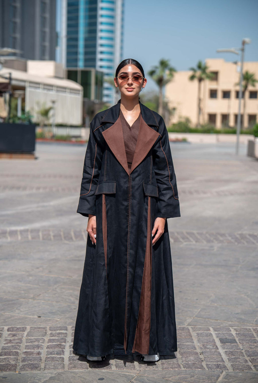 Modern Velora abaya in black and brown linen with wide lapels and street-style design