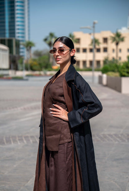 Modern Velora abaya combining black and brown linen with wide lapels and street-style design