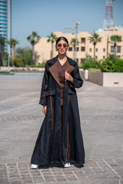 Modern Velora abaya in black and brown linen with wide lapels and structured street-style design