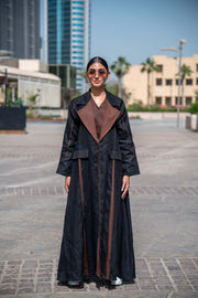 Modern Velora abaya in black and brown linen with wide lapels and structured street-style design