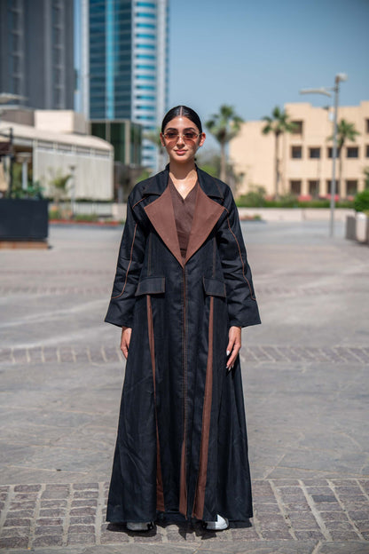 Modern Velora abaya in black and brown linen with wide lapels and structured street-style design