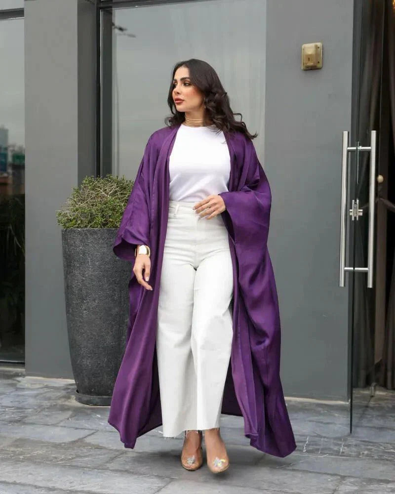 Elegant purple abaya made of shimmering silk with a loose, flowing free-size fit for casual or formal wear