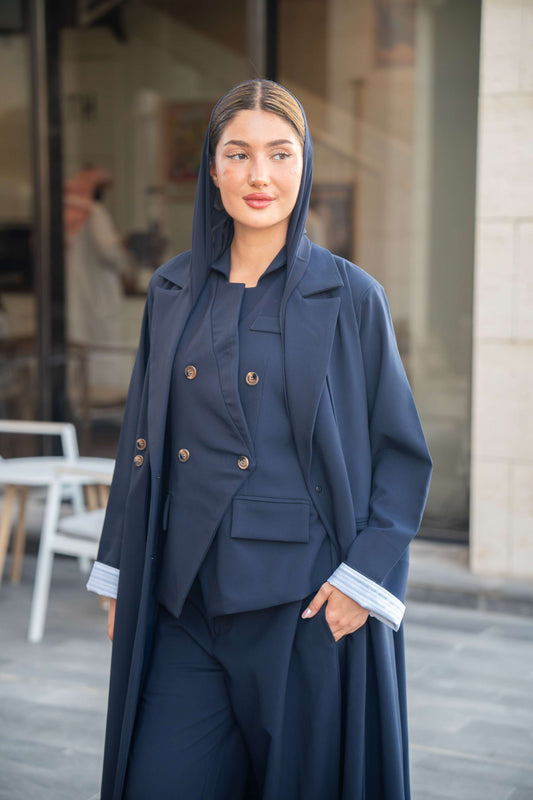801 navy blue abaya with matching blazer and pants worn by woman