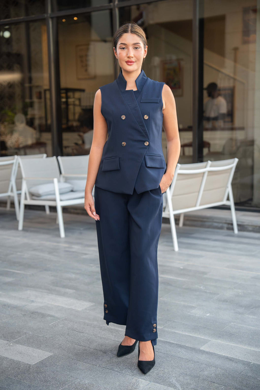 803 navy blue double-breasted vest with matching wide-leg pants worn by woman
