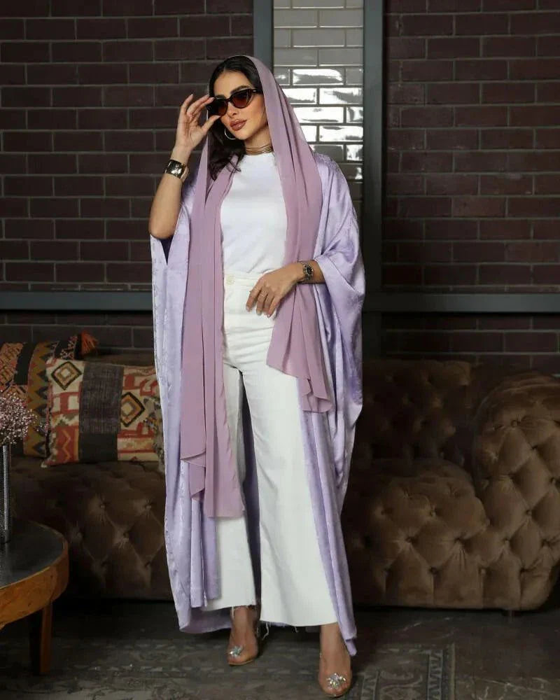 woman wearing soft and elegant mauve bisht with silky fabric and fluid drape - soft and elegant bisht