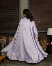 woman wearing soft and elegant mauve bisht with silky fabric and fluid drape - soft and elegant bisht
