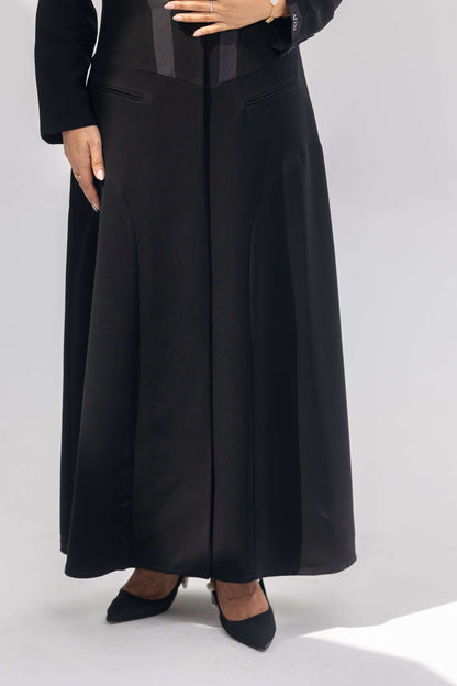 Elegant black crepe abaya with dark grey accents and silk lining, front-open and tailored for comfort and style