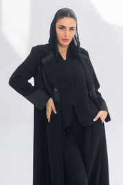 Elegant black crepe blazer abaya with contrasting textured fabric for a sophisticated and versatile look