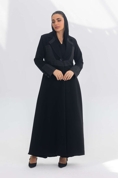 Black crepe blazer abaya with contrasting fabric detail, elegant and modern design for formal and daily wear.
