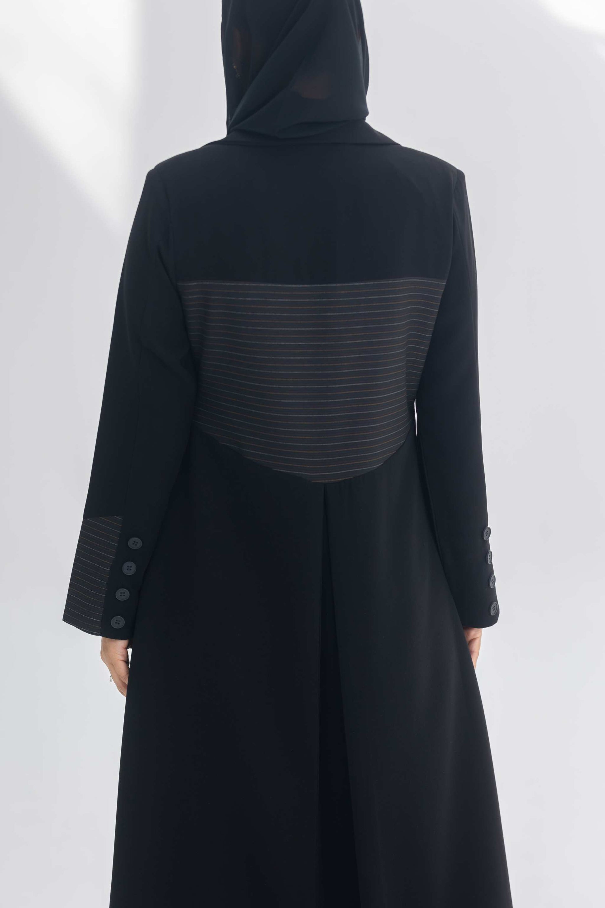 Black crepe blazer abaya with textured back panel and cuff buttons, elegant and modern design