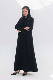 Noira Belle black crepe abaya with striped satin panels and modern elegant design