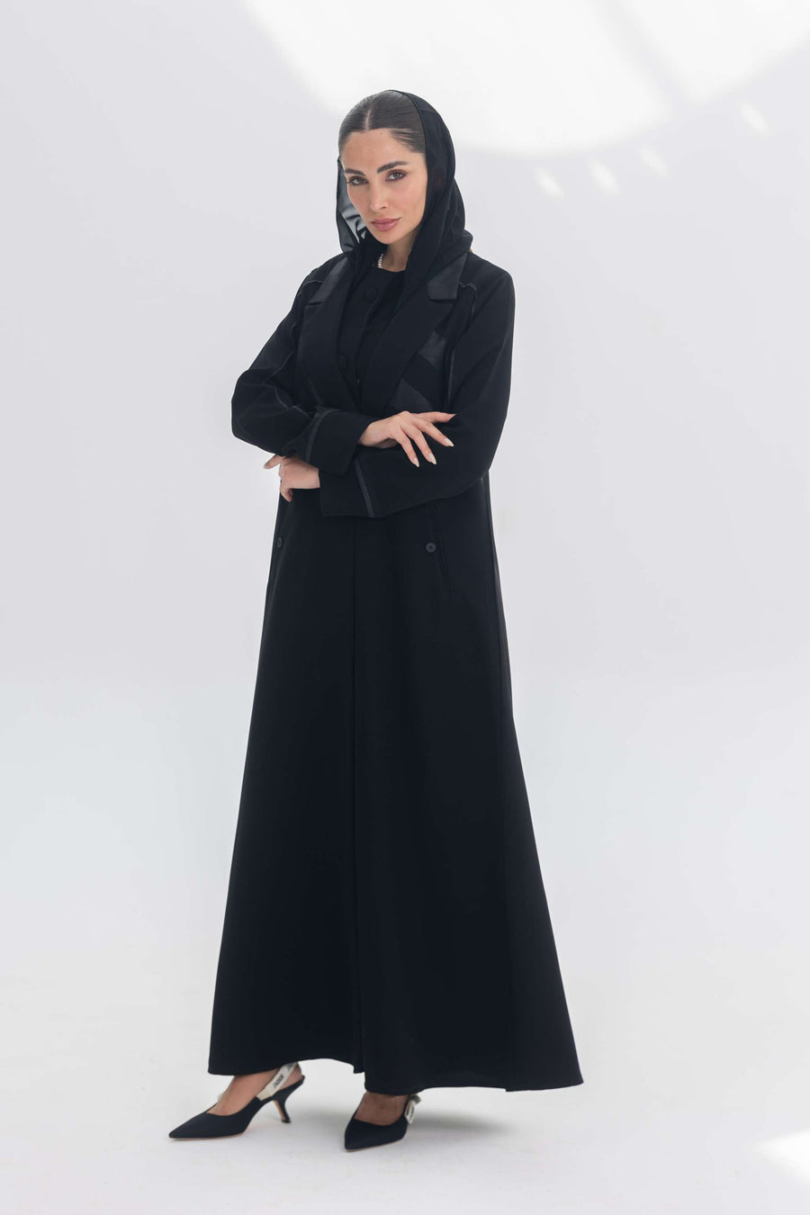 Noira Belle black crepe abaya with striped satin panels and modern elegant design