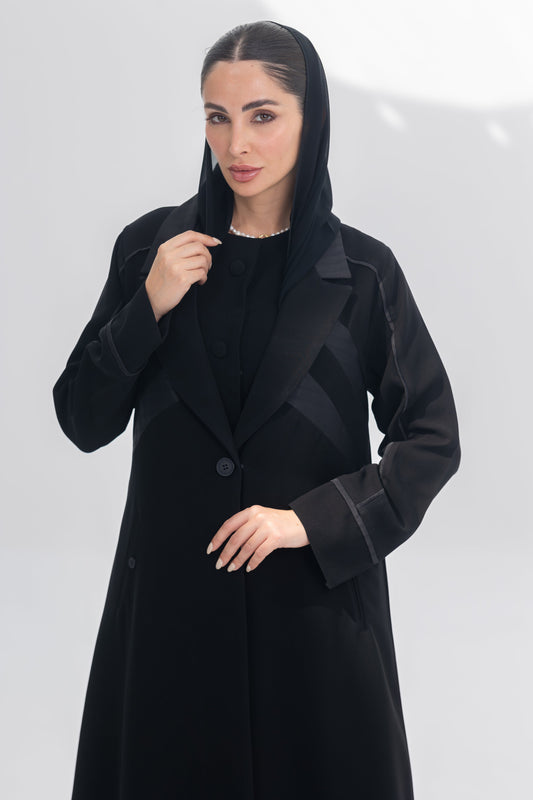 Noira Belle black crepe abaya with striped satin panels and modern elegant design