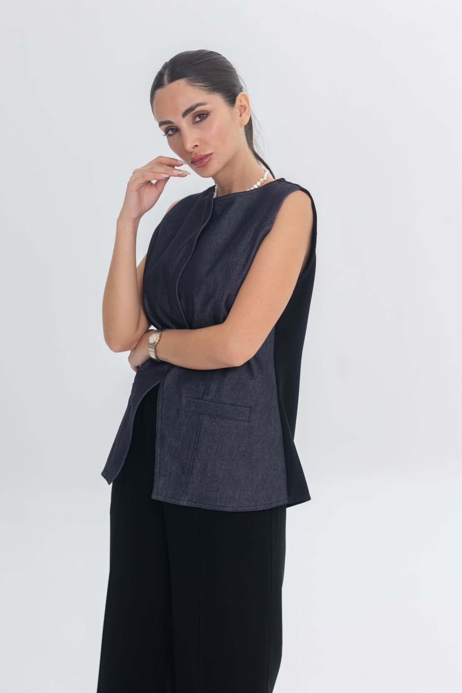 Woman wearing True Bleu denim top and black crepe pants inner set