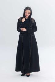 Black abaya with rich brown Cocoa Shadow detailing creating a 3D effect and elegant silhouette.