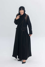 Black abaya with rich brown Cocoa Shadow detailing and 3D effect showcasing elegant, contemporary design.