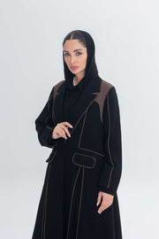 Black abaya with rich brown 3D detailing and Cocoa Shadow design, blending tradition and contemporary style.