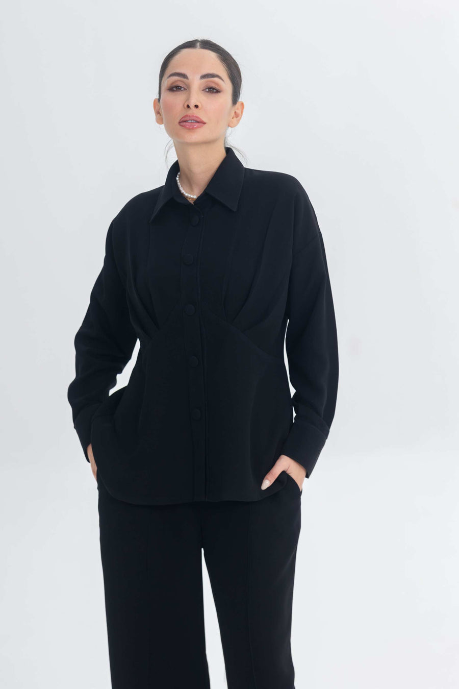 Essense Folds modern black inner set with sleek silhouette and modest design for layering under abayas