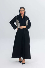 Elegant black crepe abaya with jacquard panel detailing on sleeves and sides