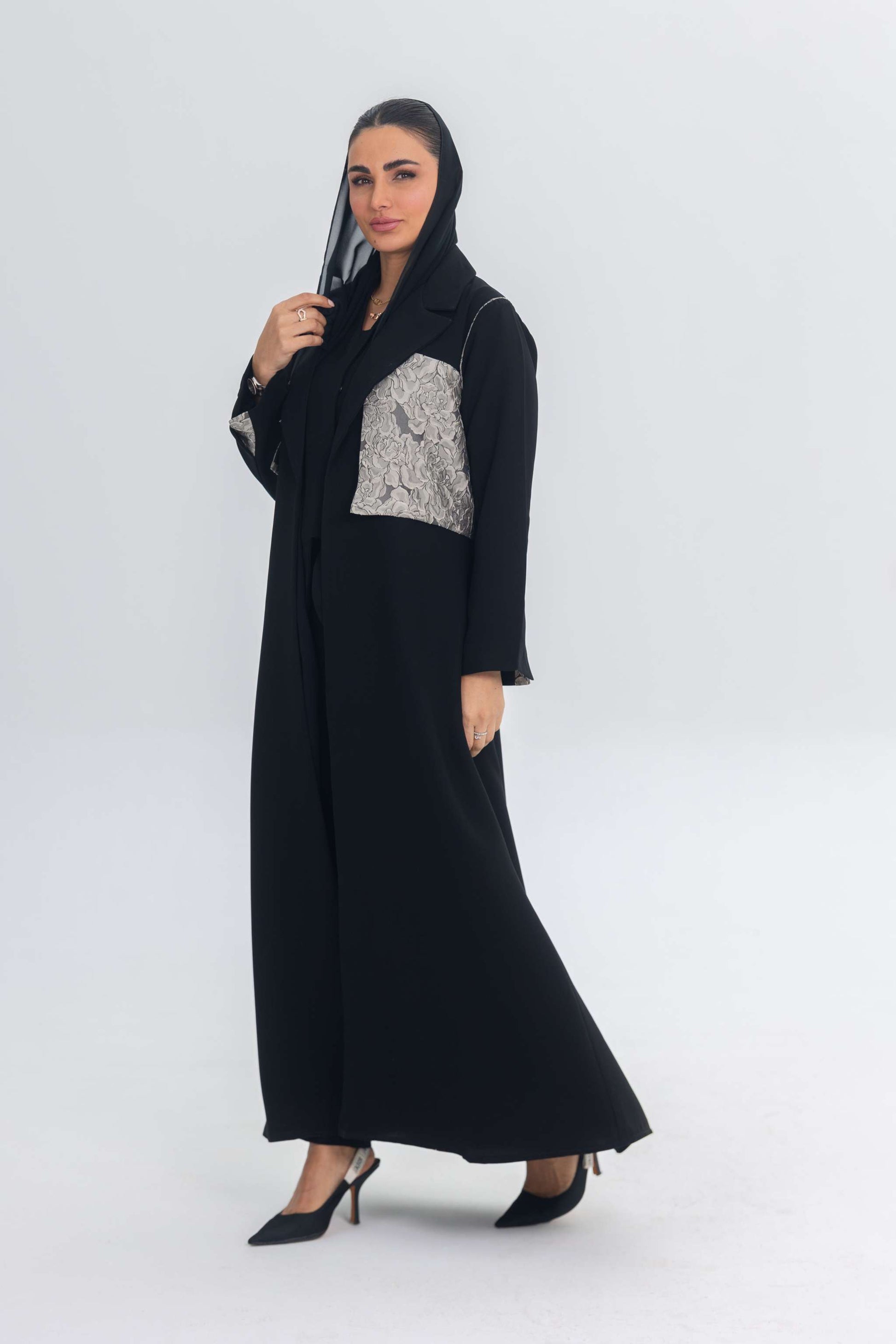 Elegant black crepe abaya with contrasting jacquard panel and flowing design