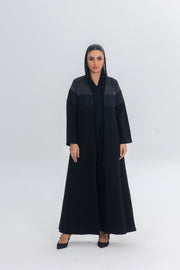 Black Satin Eclipse abaya with crepe and lace details, elegant and flowing design for regal occasions