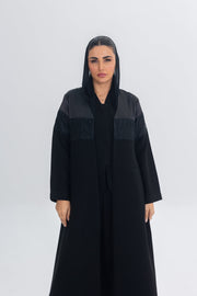 Black Satin Eclipse abaya with crepe fabric and intricate lace detailing, elegant and flowing design