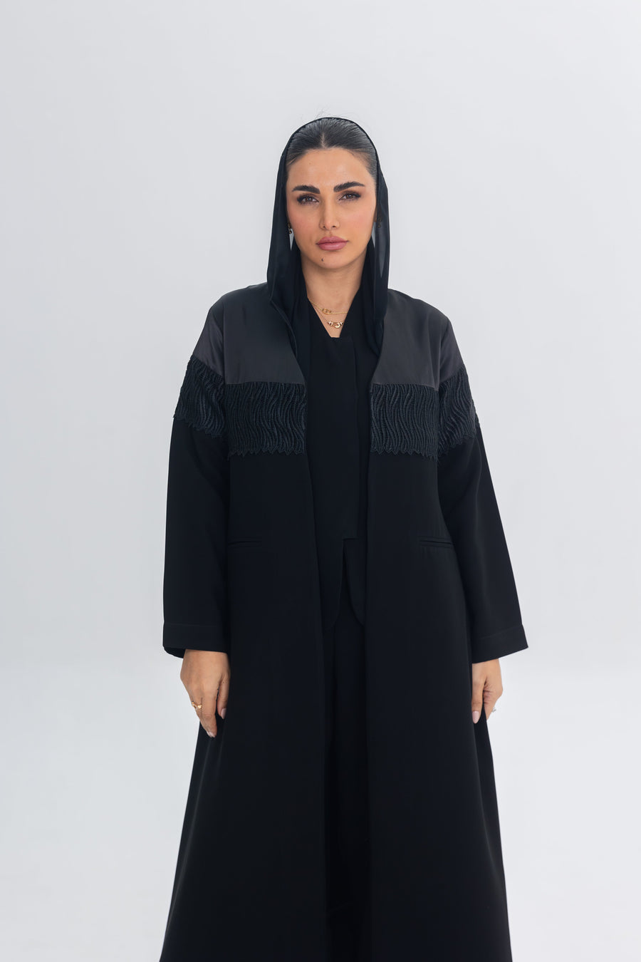 Black Satin Eclipse abaya with crepe fabric and intricate lace detailing, elegant and flowing design
