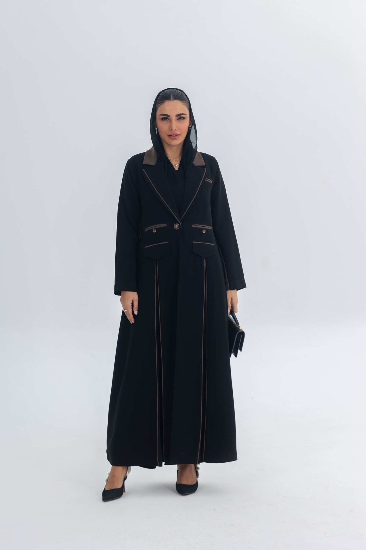 Black crepe blazer abaya with chestnut brown trim and tailored sleek silhouette for elegant modern style