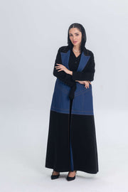 Black crepe abaya with blue denim panels, modern and elegant design for formal wear