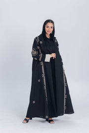 Black luxury linen abaya with beige circular embroidery and structured flow for elegant everyday or evening wear