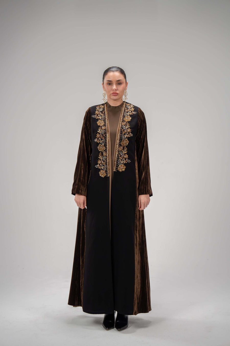 Elegant abaya with luxurious velvet sleeves and intricate machine embroidery on the crepe body