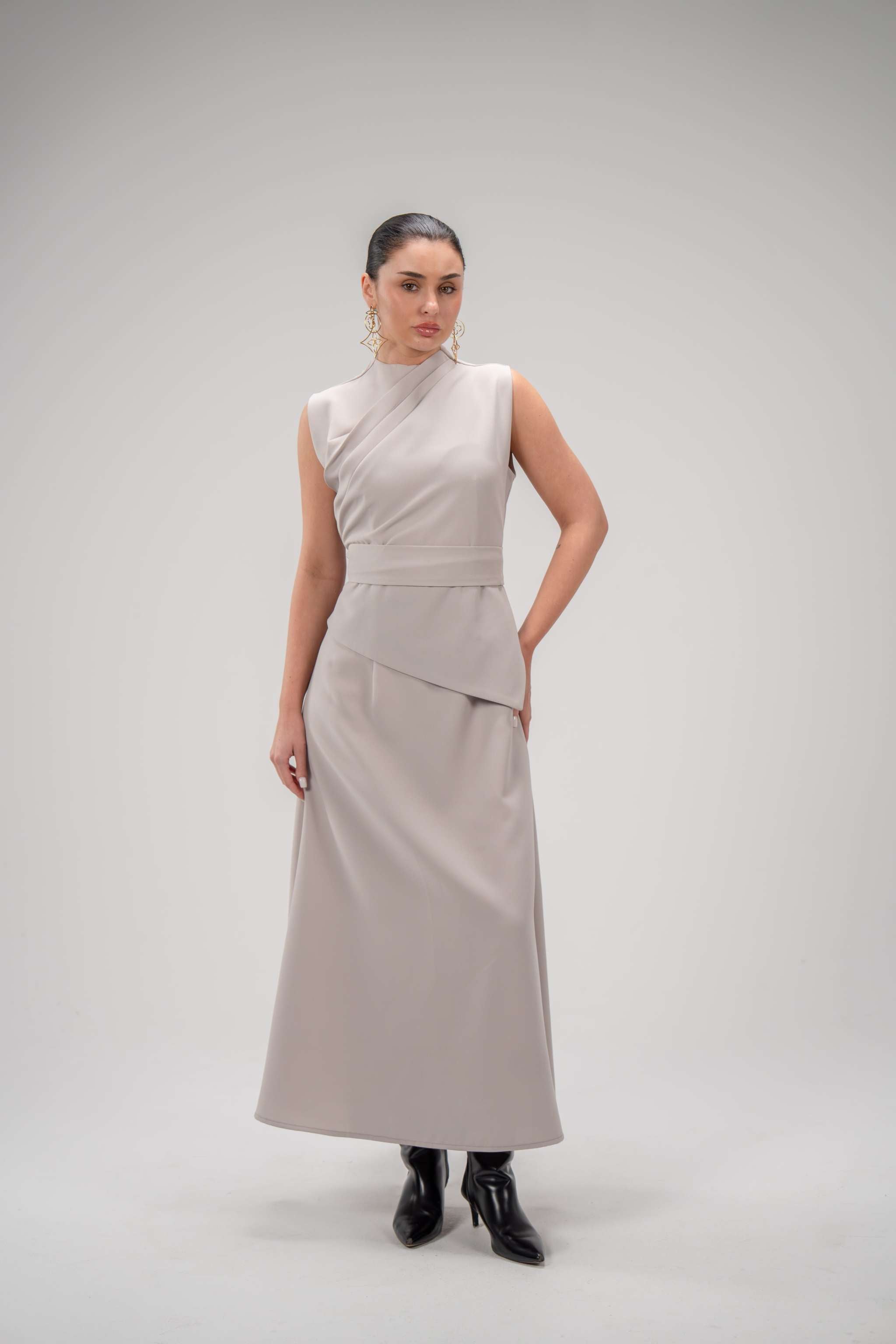 Luxury beige crepe dress with pleated neckline and matching belt for elegant look
