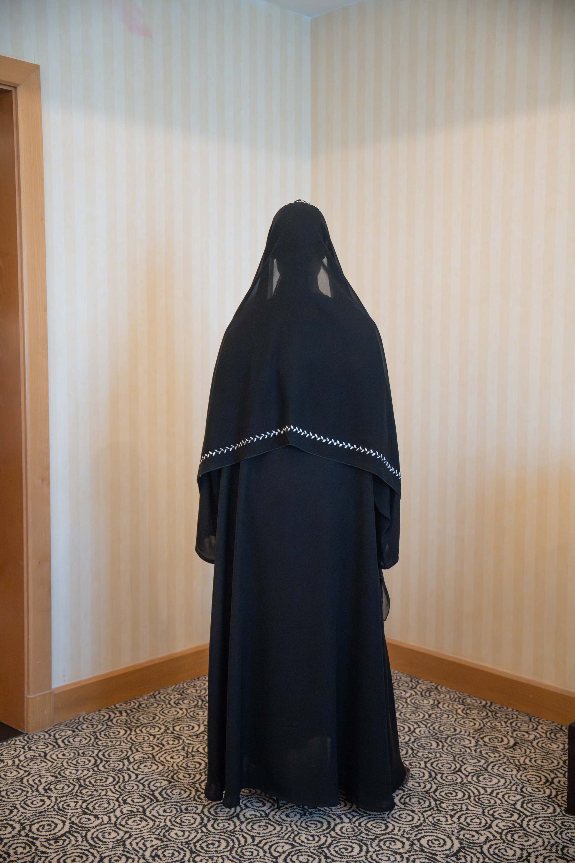 Elegant black abaya with white embroidery and matching embroidered sheila veil