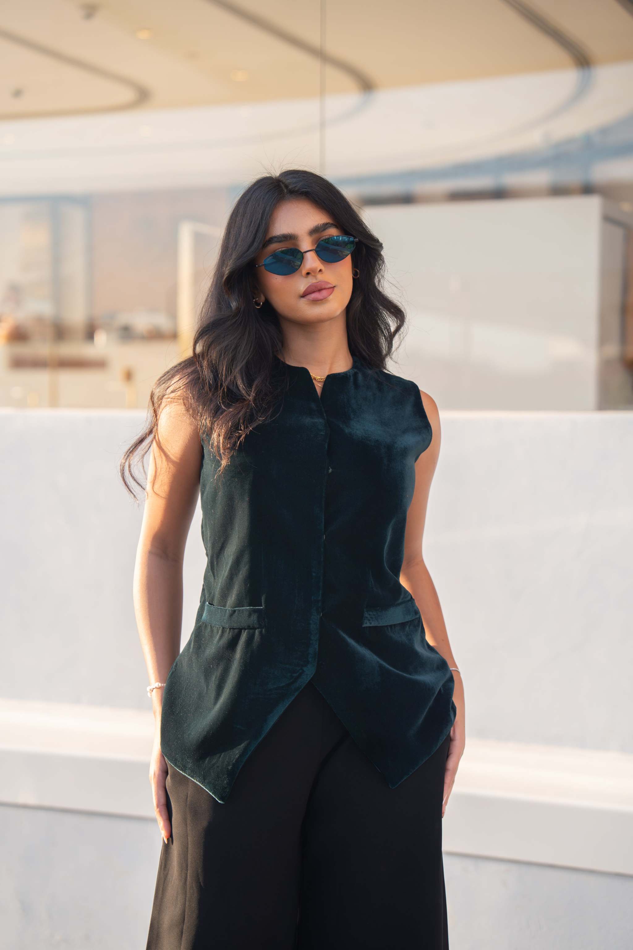 Elegant dark green velvet vest for layering over abayas or dresses