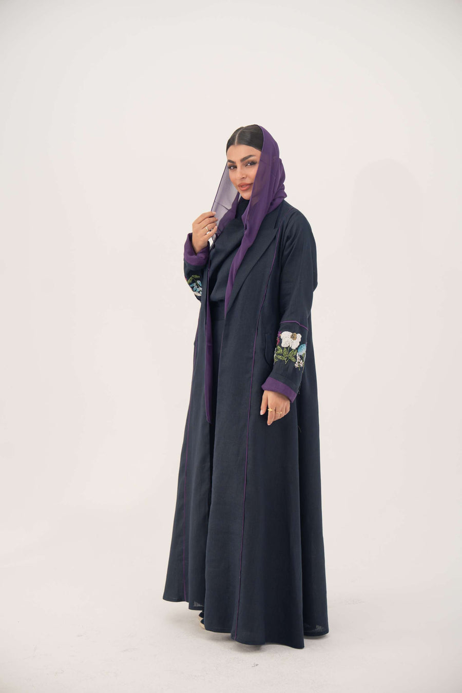 Blackberry navy blue linen-blend abaya with purple cuffs and hand-stitched floral embroidery