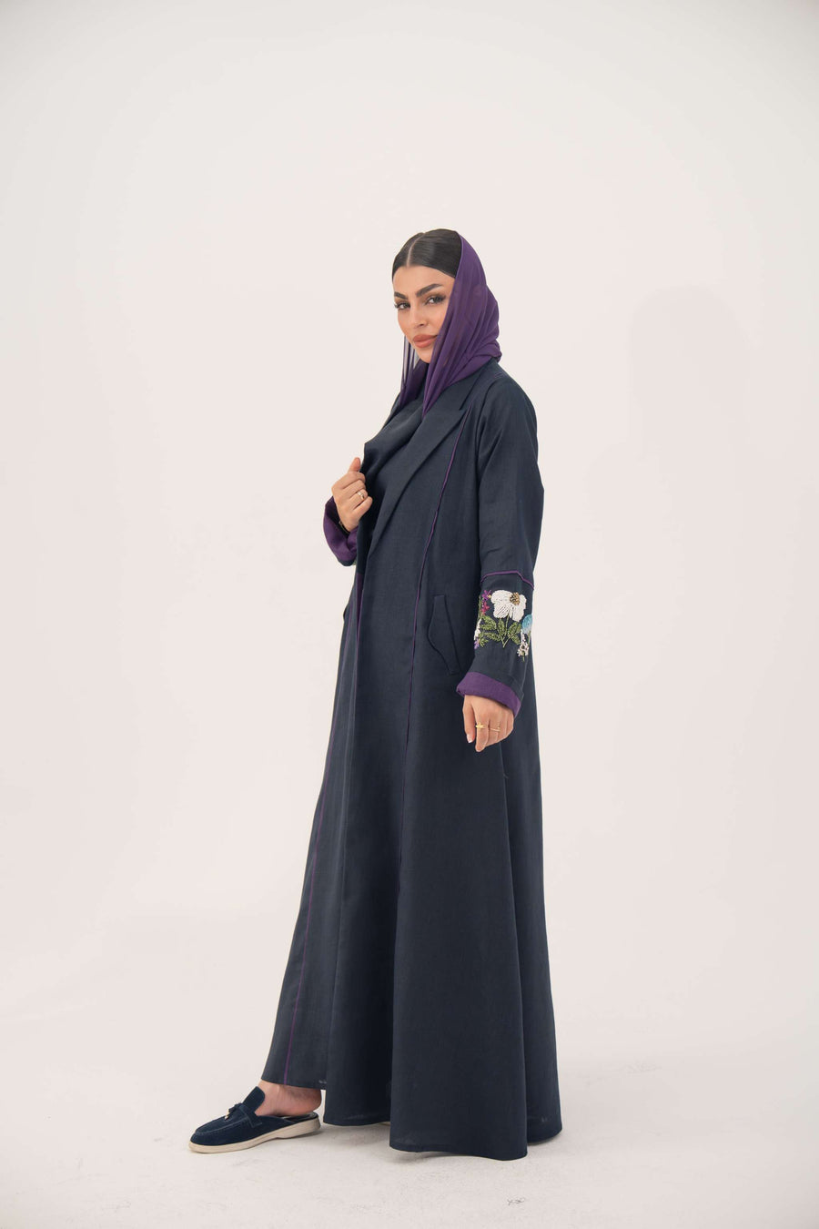 Blackberry navy blue linen-blend abaya with purple cuffs and hand-stitched floral embroidery