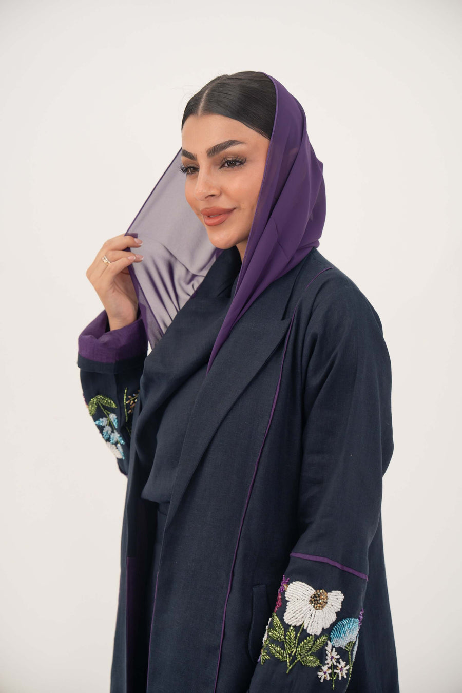 Blackberry navy blue linen-blend abaya with purple cuffs and hand-stitched floral embroidery