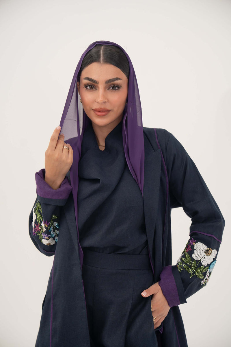 Blackberry navy blue linen-blend abaya with purple cuffs and hand-stitched floral embroidery