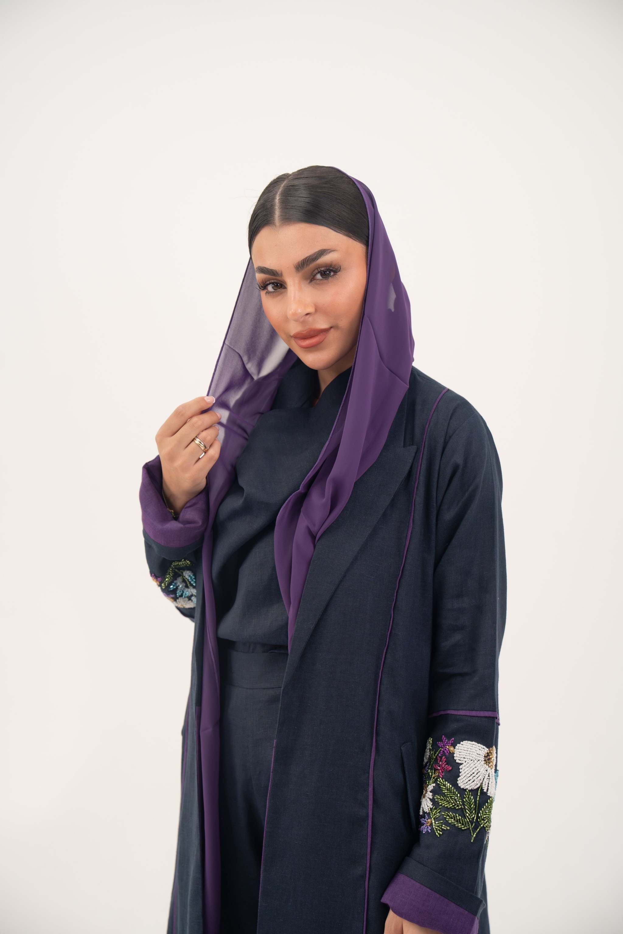 Blackberry navy blue linen-blend abaya with purple cuffs and hand-stitched floral embroidery