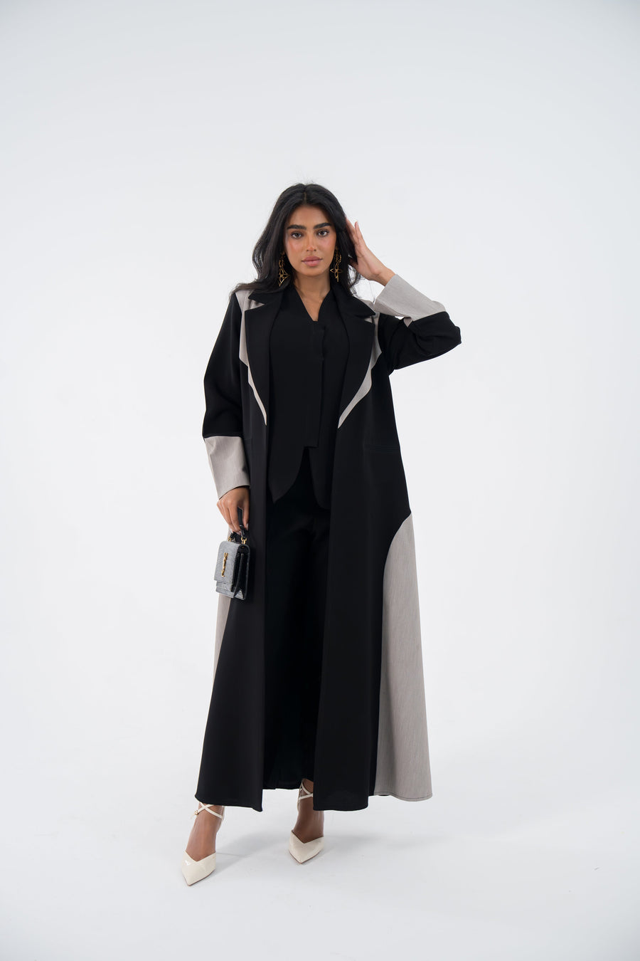 Woman wearing black and grey Shadow Blazer Crepe abaya with embroidery and relaxed blazer cut